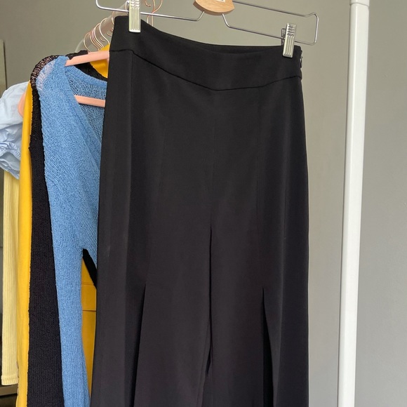 Flared wide legged pants with high slits - Picture 3 of 4